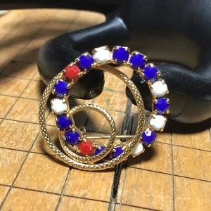 60s or 70s Style Red White Blue Gems Gold Swirl Costume Brooch EVC 1.25”D